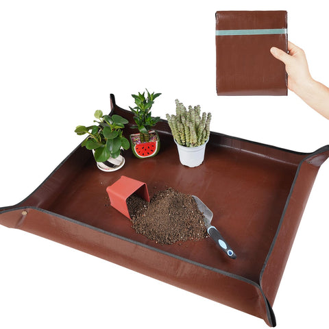 HNXTYAOB repotting mat laid out on counter for neat transplanting