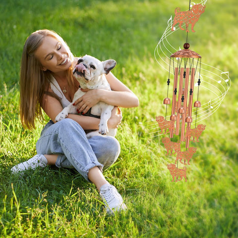 Hoemwarm pug wind chimes hanging in garden setting
