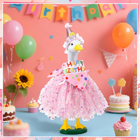 Silver crown and rhinestone necklace sparkle on garden goose statue.