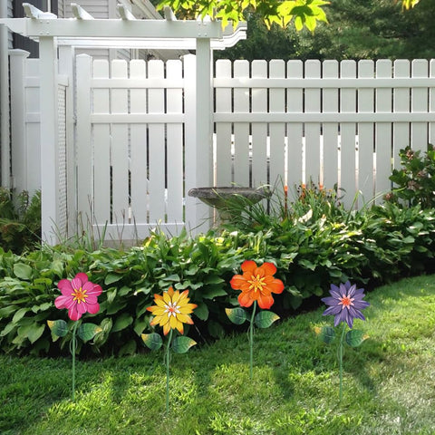 hogardeck metal flower stake orange bloom shaker adds warm color and subtle motion to borders.