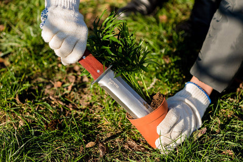 HOKURU Hori Hori knife cutting and pruning for versatile garden use.