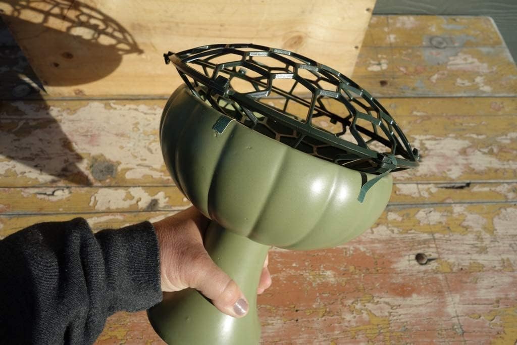 Holly Heider Chapple lightweight plastic floral cage supports stems with easy vase transfers.