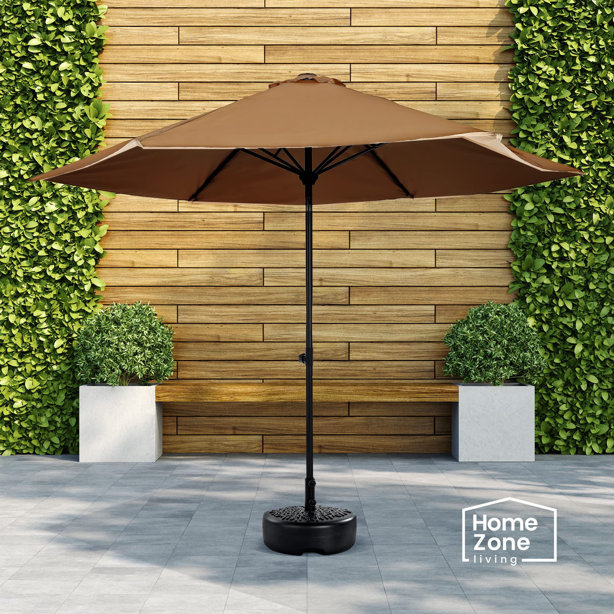 Home Zone Living base supports 6 to 10 ft umbrellas for flexible shade.