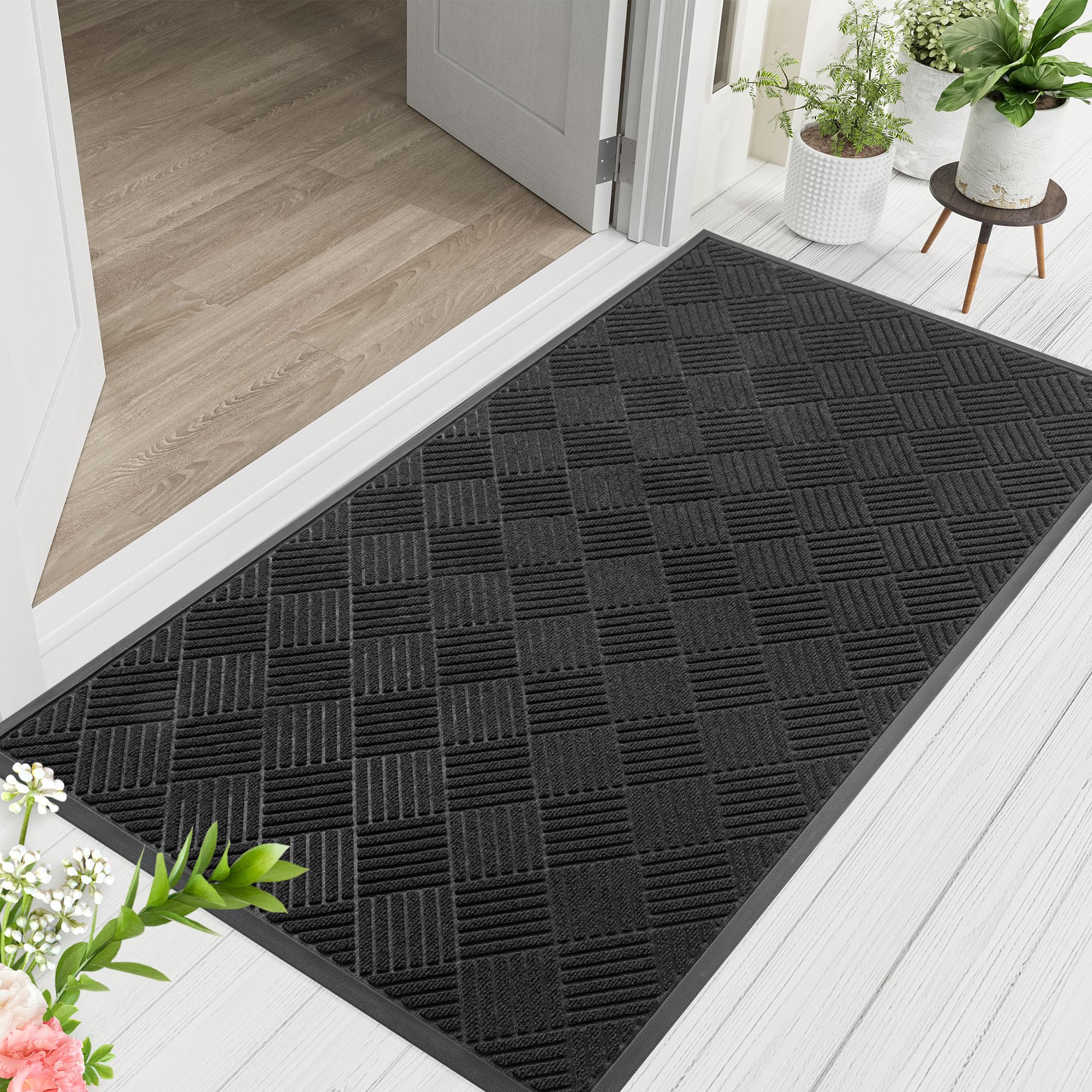 HOMEK door mat dirt-trap detail highlighting moisture capture