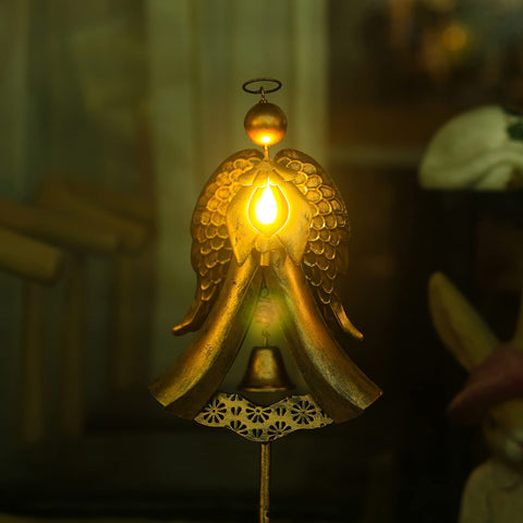 Homight night lit angel stake emits a gentle evening glow