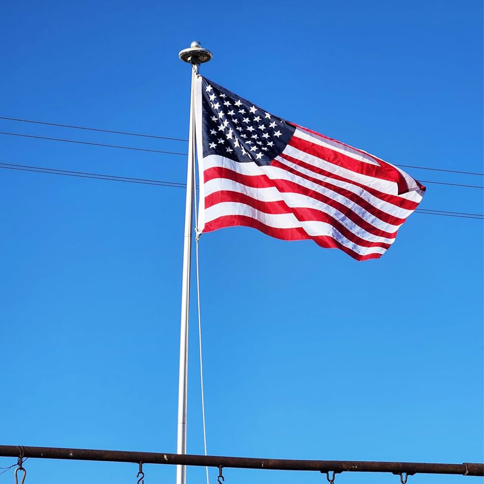 Homissor flag with embroidered stars for lasting national display.