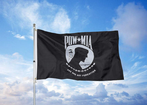 Homissor POW MIA flag hanging in a window for display