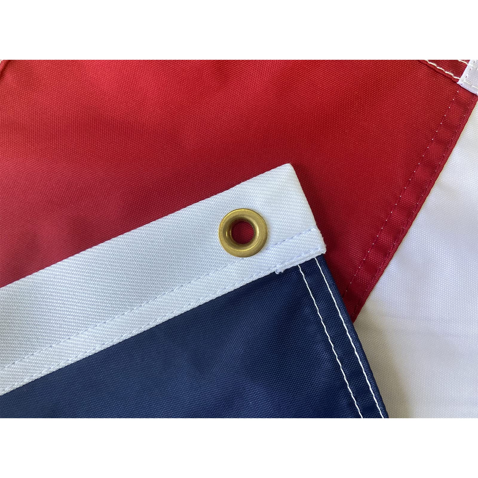 Brass grommets on the Homissor flag enable easy hanging.