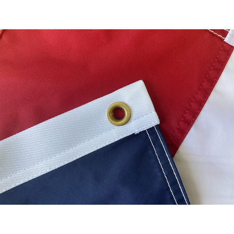 Brass grommets on the Homissor flag enable easy hanging.