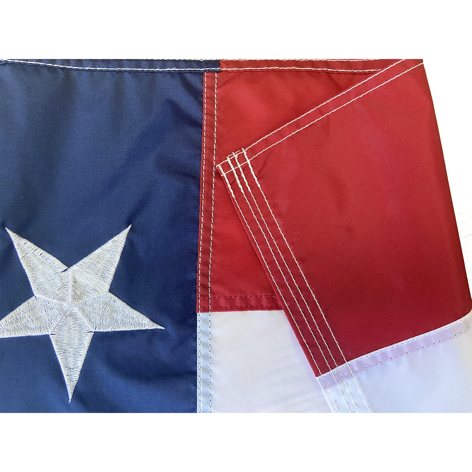 Fly end shows four rows of lock stitching on the Homissor flag.