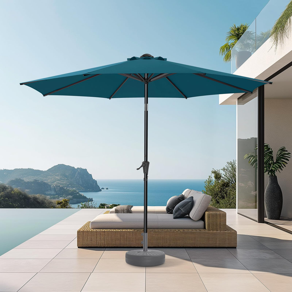 HOMSHADE 9ft umbrella canopy in peacock blue demonstrates fade resistance.