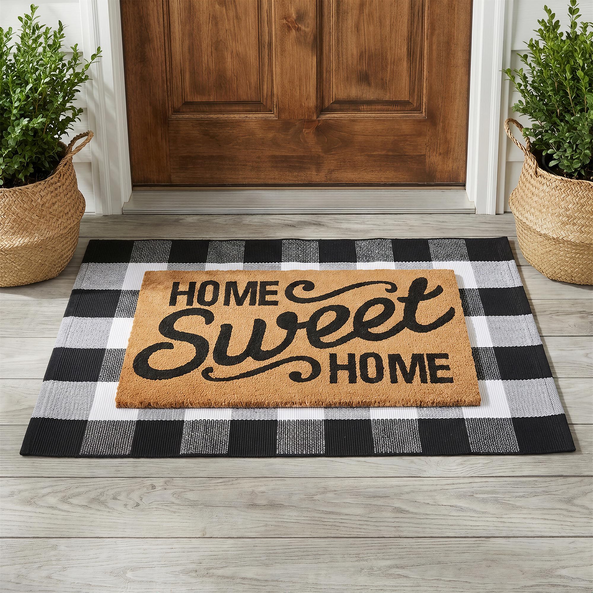 Homydecor Home Sweet Home coir mat welcomes guests at the entry, trapping dirt.