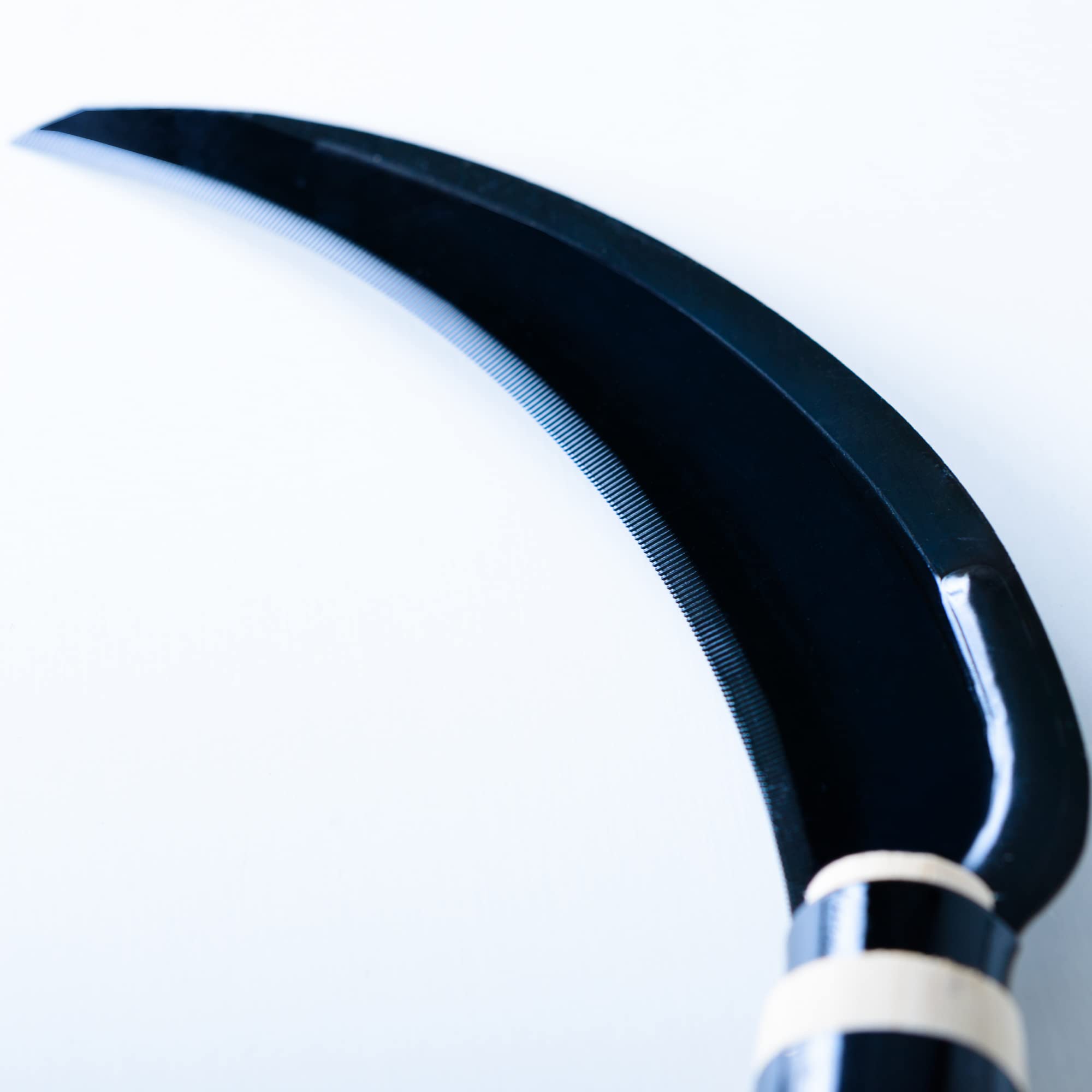 HONEN blade close-up highlighting SK-5 steel and durability