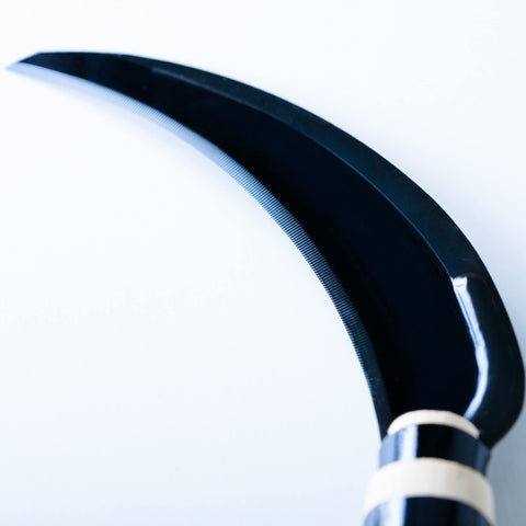HONEN blade close-up highlighting SK-5 steel and durability