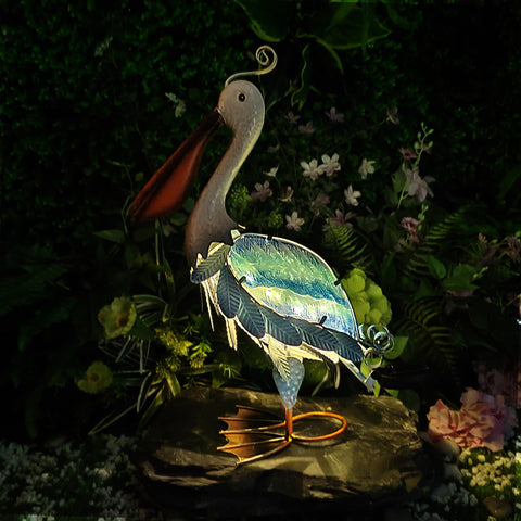 HONGLAND outdoor pelican statue blends iron and glass for durable coastal garden art.