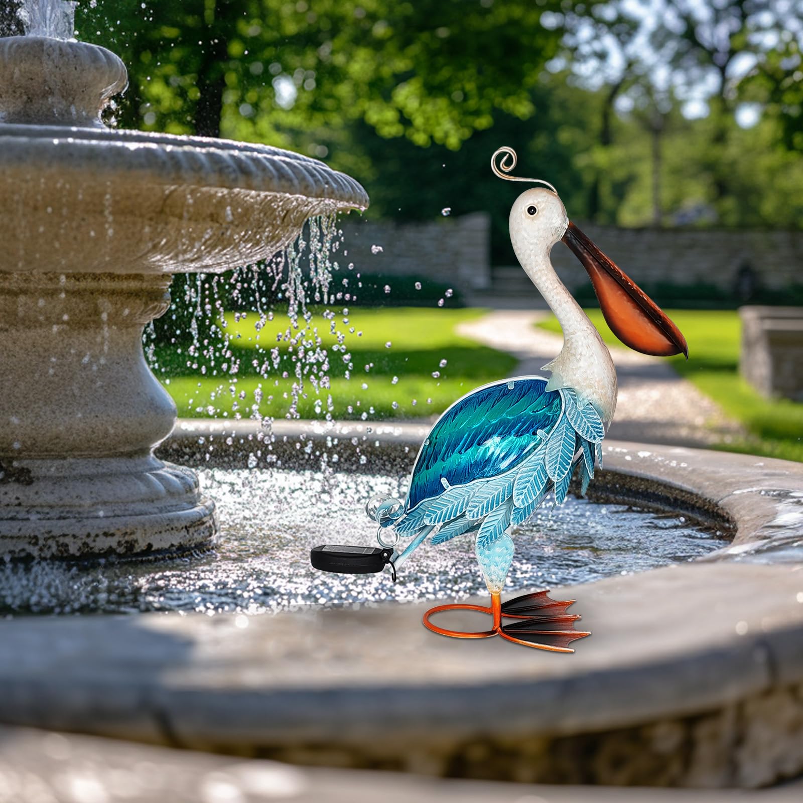 HONGLAND pelican statue at night illuminated by solar light for ambient mood.