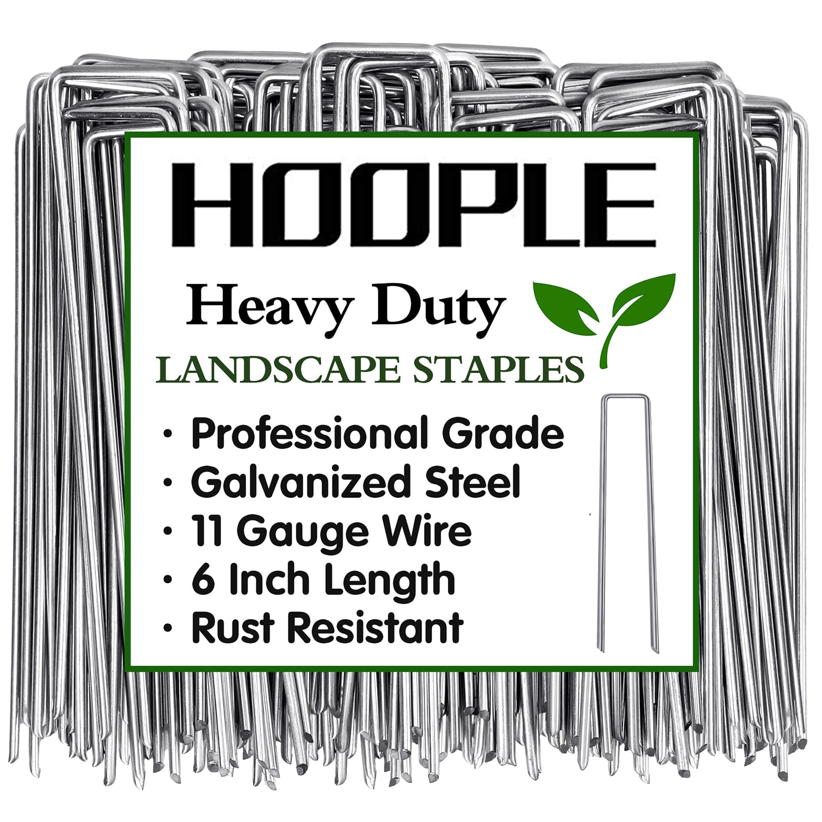 Hoople 6in landscape staples securing weed barrier fabric for lasting hold.