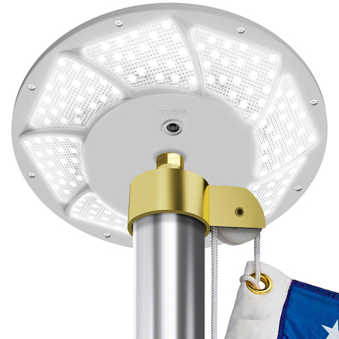 HOOPLE solar flag light with bright LEDs illuminating a flag at night