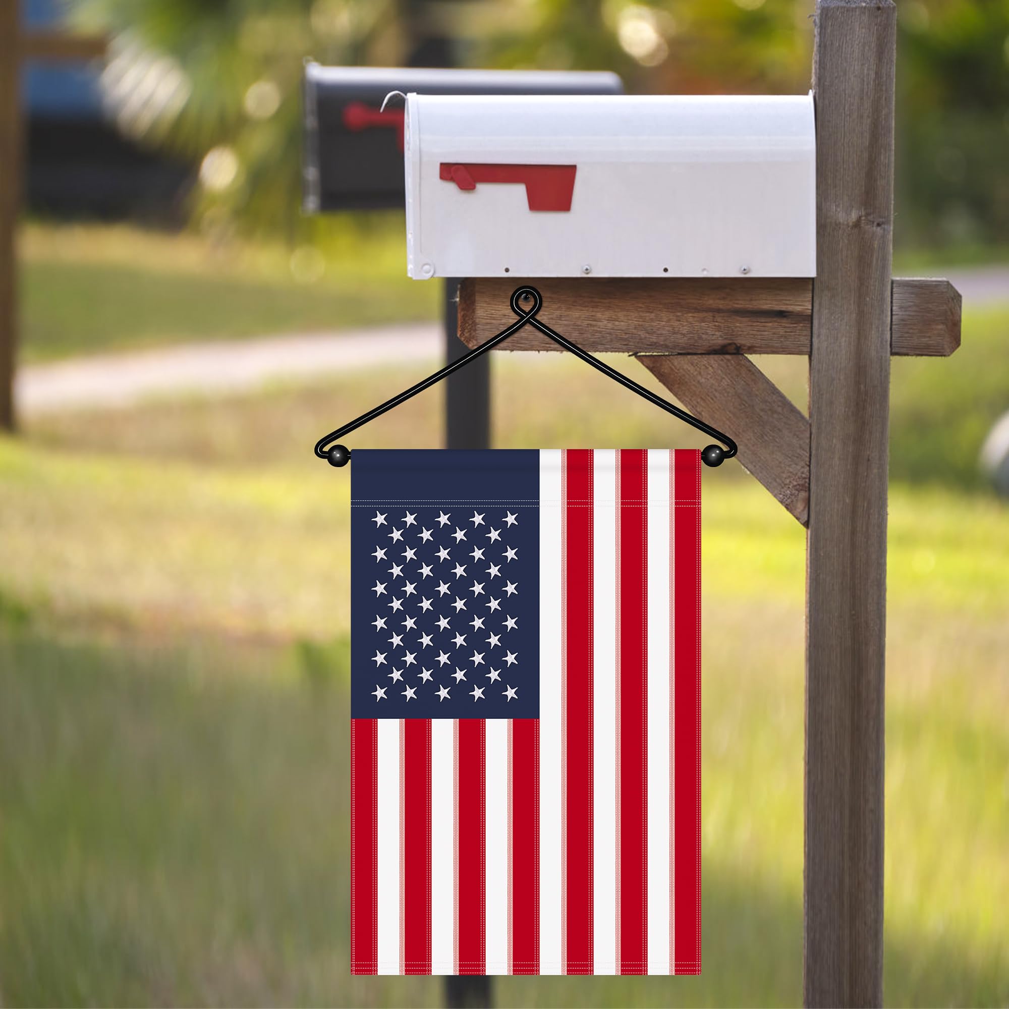 HOOSUN yard flag hanger decorating a front door and mailbox area.