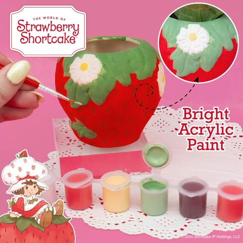 Horizon Group USA Paint Your Own Strawberry Shortcake Planter features a drainage hole for plant care.