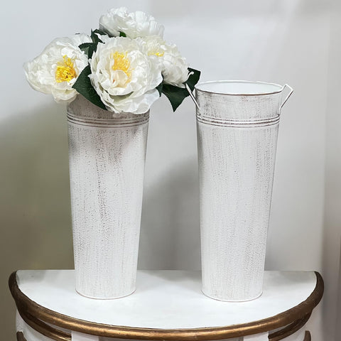 Hosley floral arrangement bucket enhances indoor and outdoor ambiance.