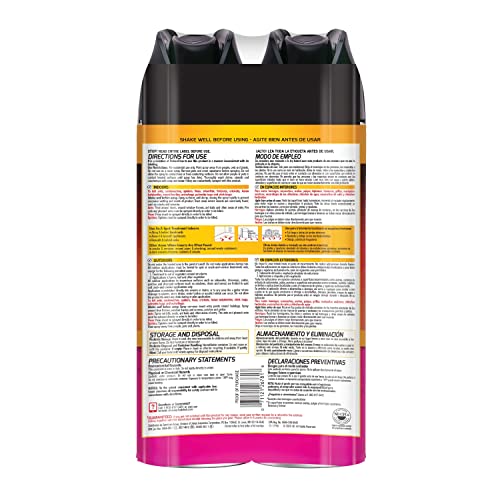 Hot Shot aerosol can spraying along baseboards for indoor pest control.