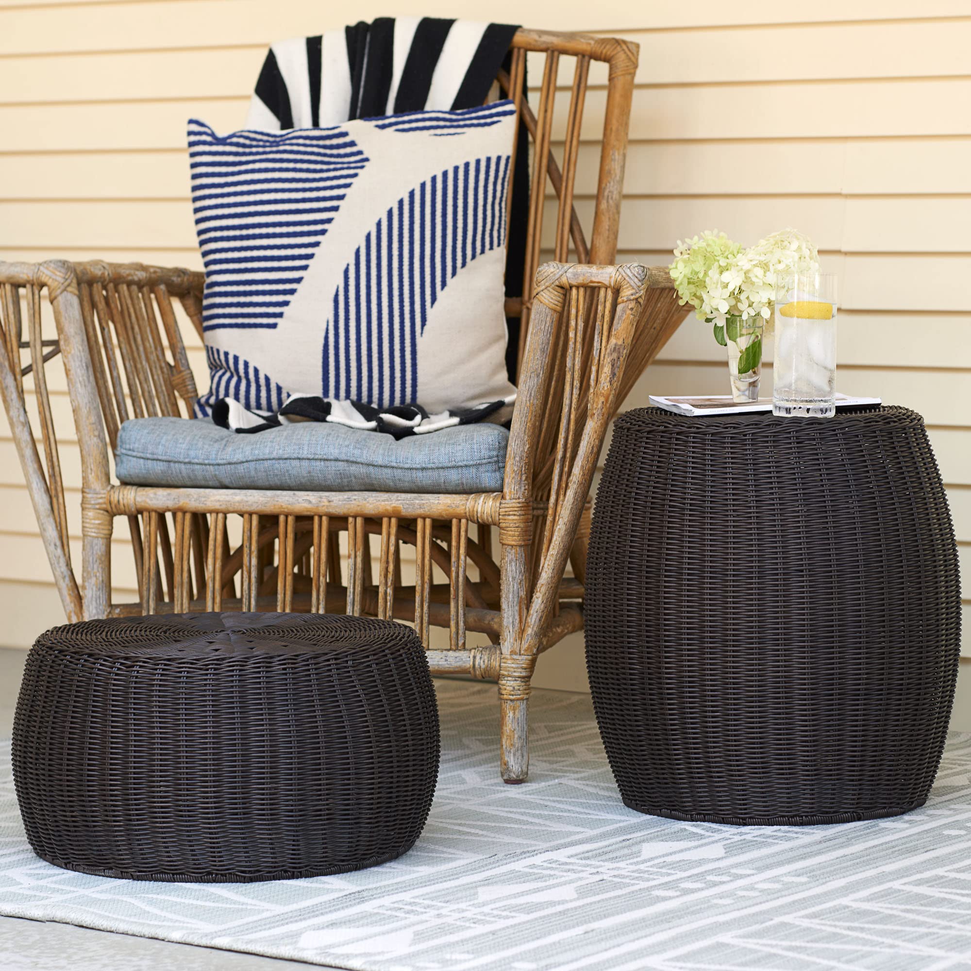 Brown resin stool complements patio and living room decor.