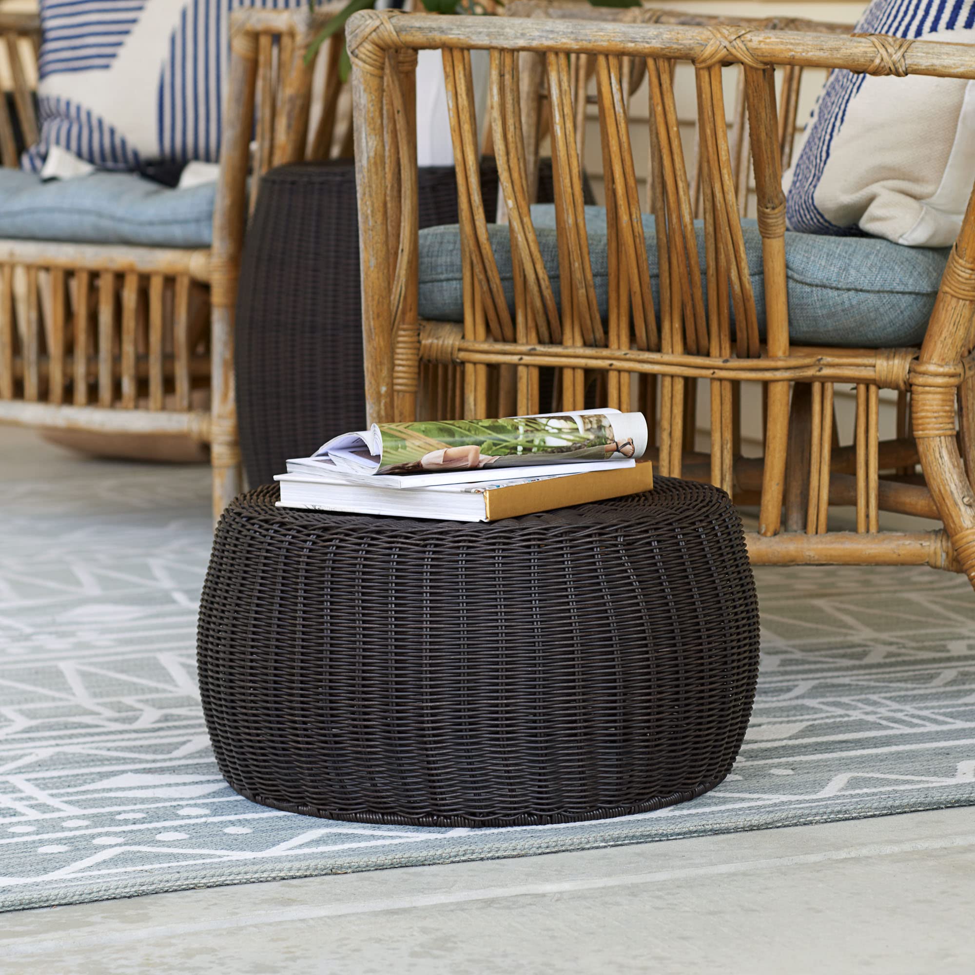 Household Essentials storage stool used as a footrest in a cozy living area.