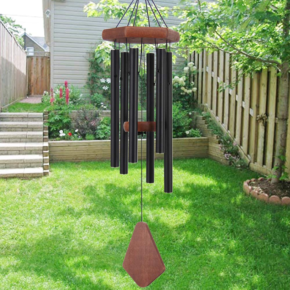 Howarmer wind chimes outdoors in black finish grace a garden with a tuned melody.