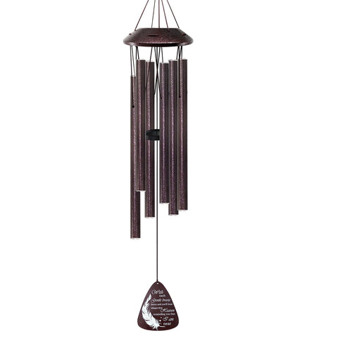 Howarmer wind chimes sunset garden scene evokes peaceful reflection.