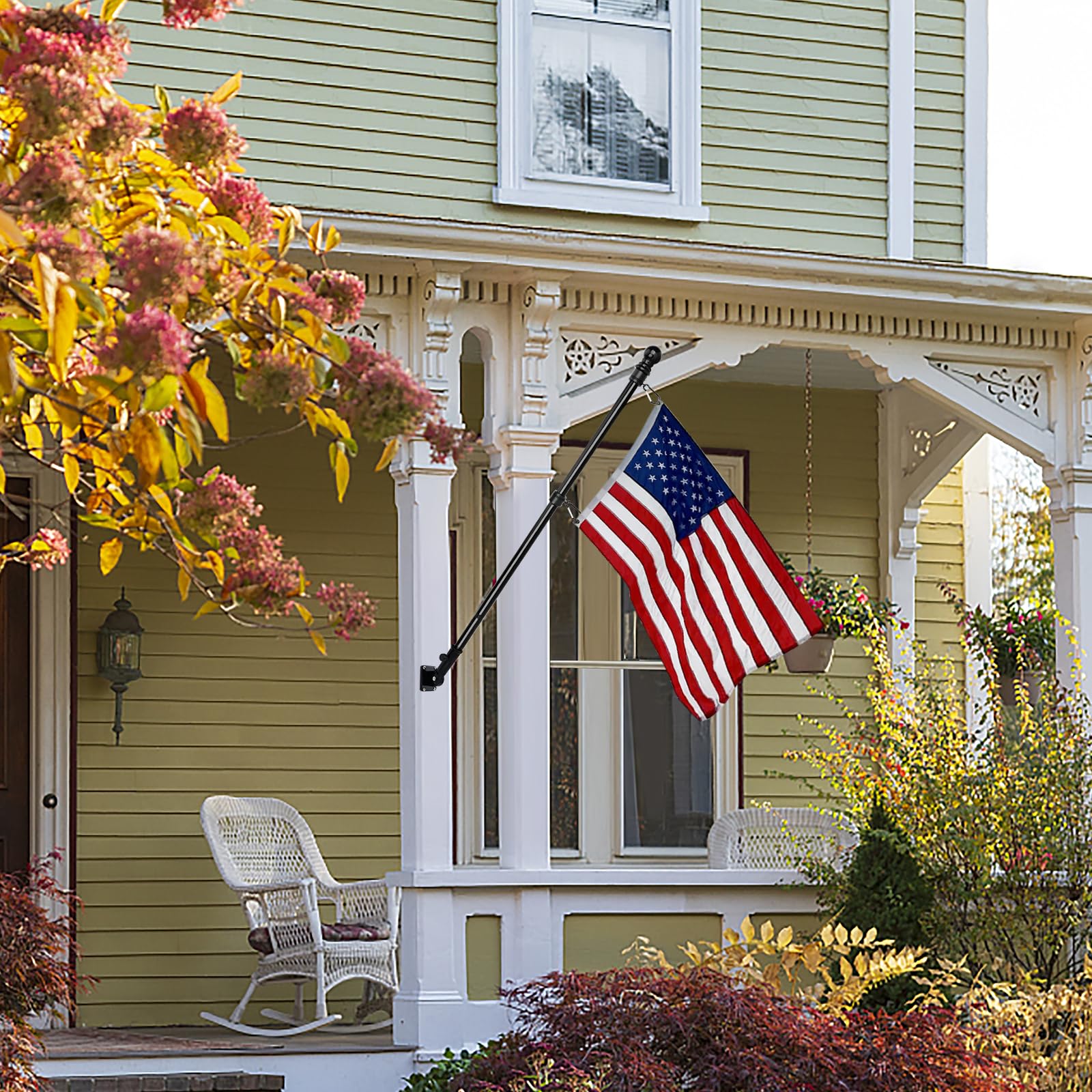 Outdoor porch display setup with HPGOED flagpole kit ready for use.
