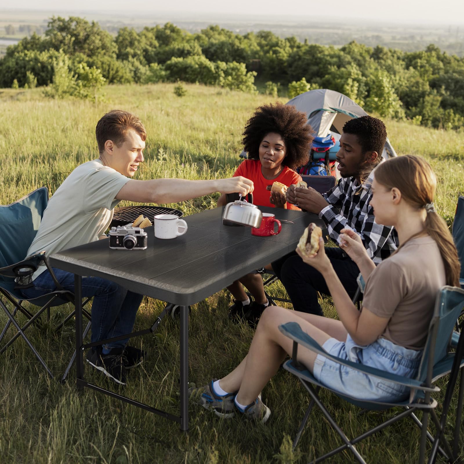 Hsundries heavy-duty folding table in use for outdoor gatherings and BBQs.