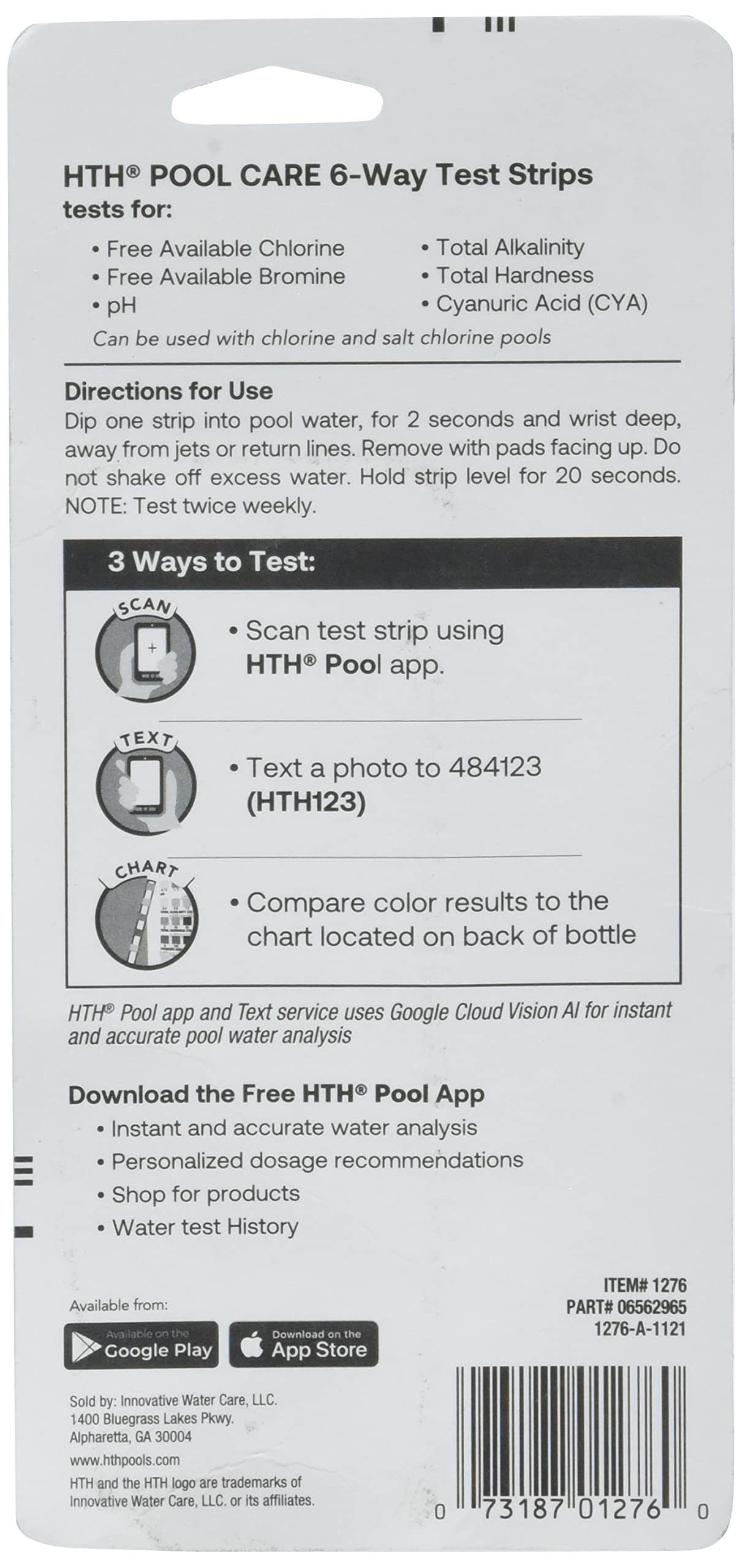 HTH Test to Swim strip being dipped for easy chlorine and pH checks.