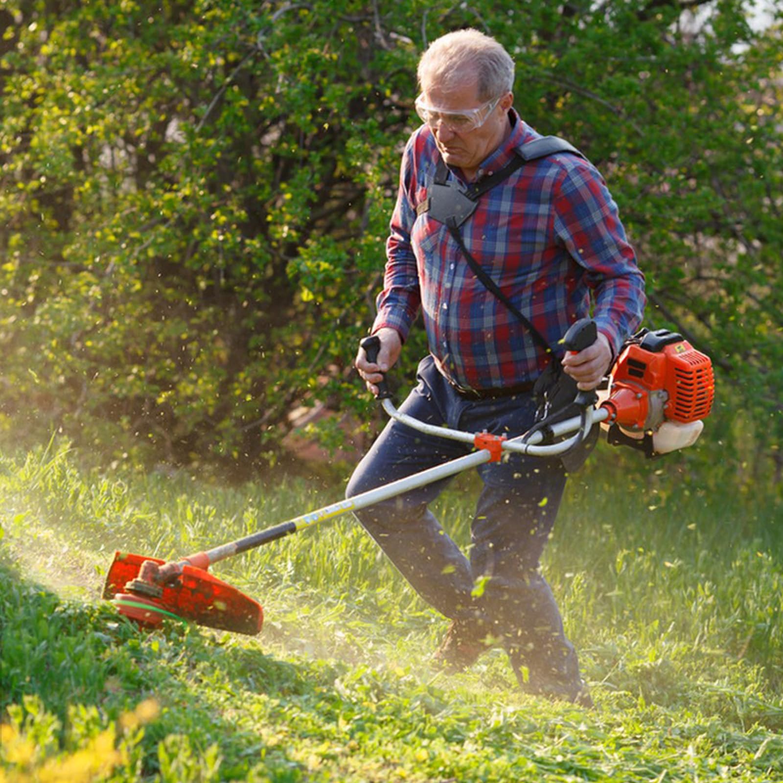 Huakaile blades in use on a compact lawn mower