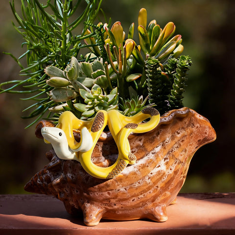HUFAND miniature banana snake statue offers a unique gift for plant lovers.