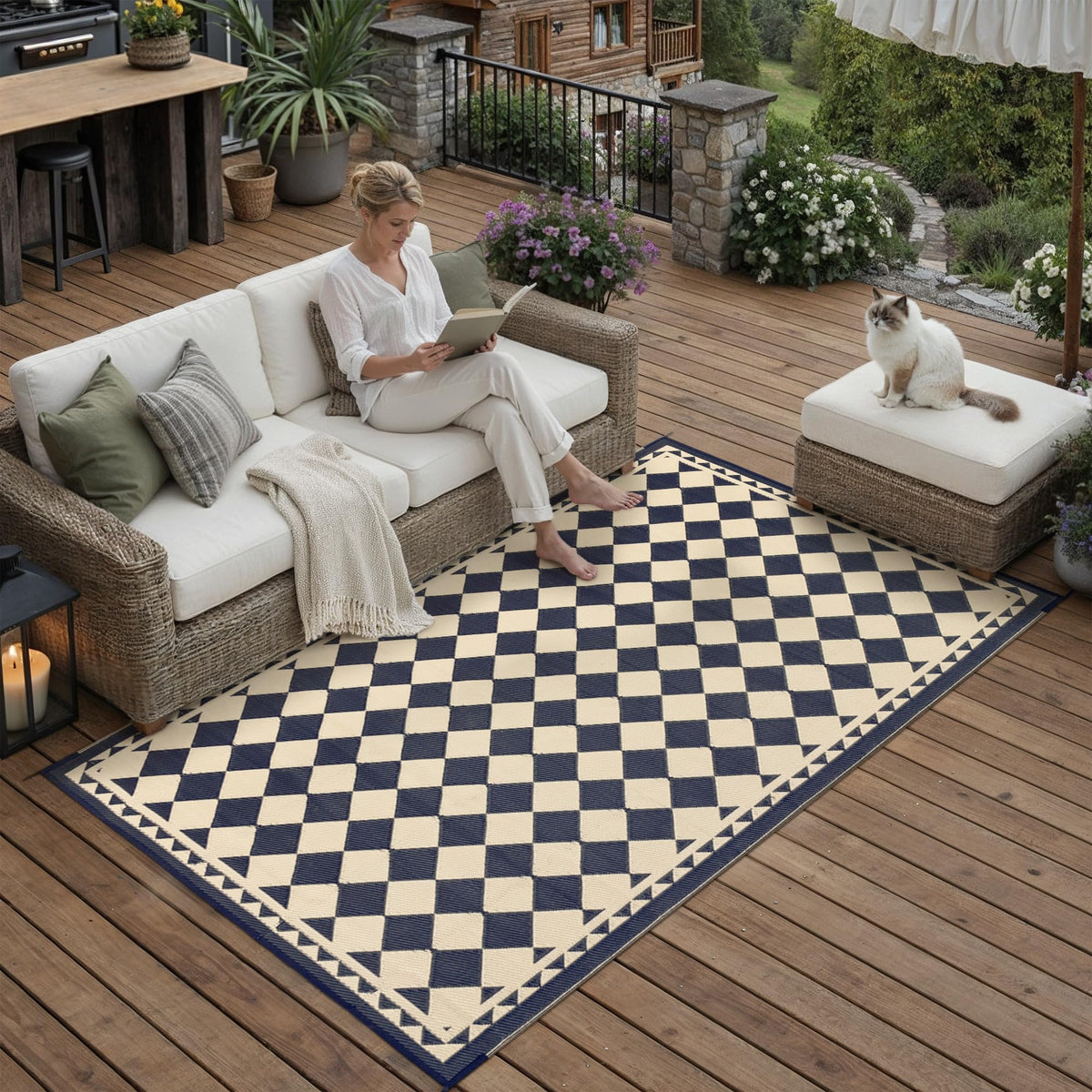 HUGEAR outdoor rug on patio, weatherproof and reversible for year-round use.