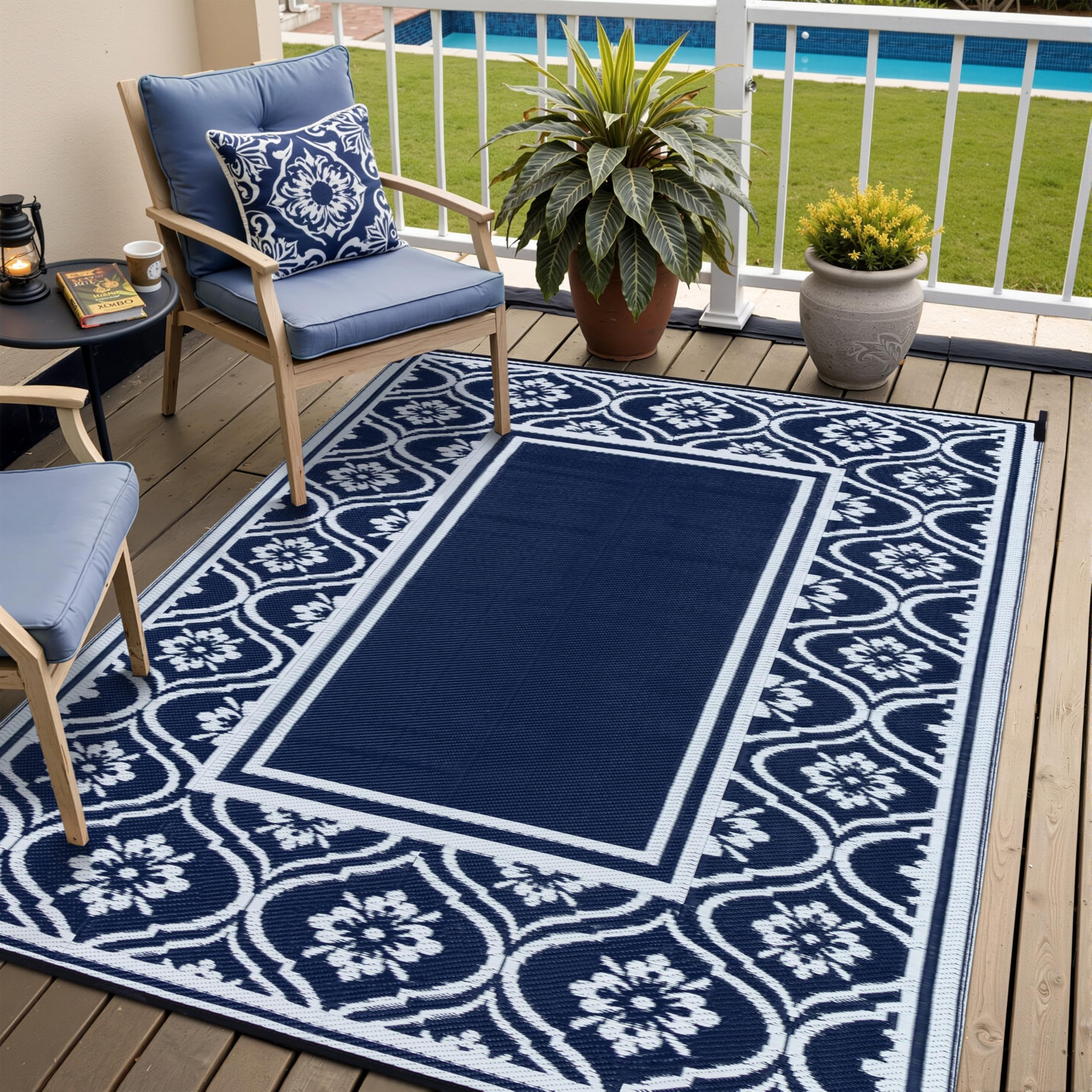 HUGEAR blue reversible outdoor rug shown on patio for porch and deck use