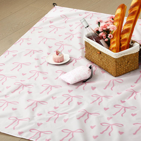 HunnmingRe Pink Bow Pocket Picnic Blanket folded for easy storage