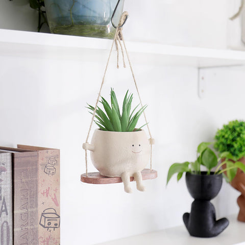 HUNTHAWK face pot swing head showcases whimsical decor for gardens or kitchens.
