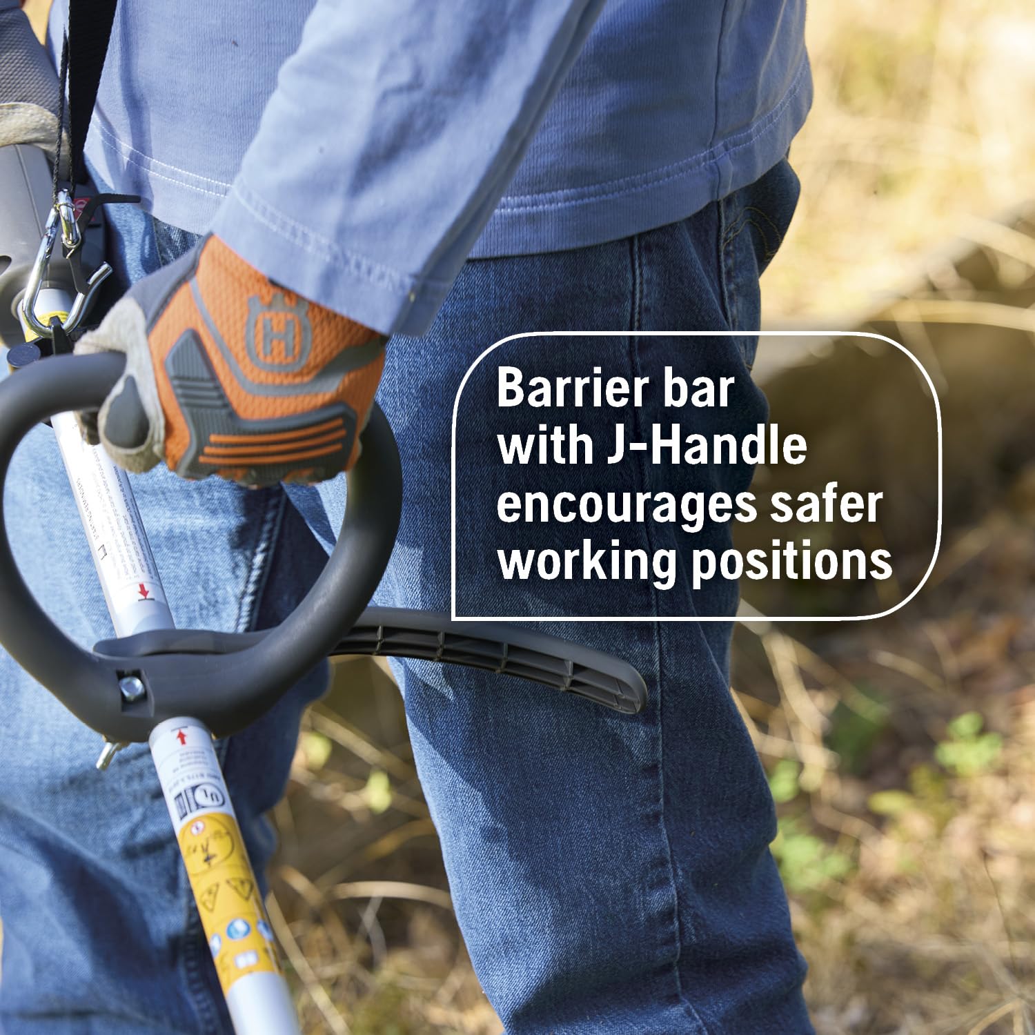 Barrier bar and J-handle promote safer operating posture on Husqvarna 122RJ