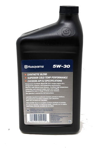 Husqvarna oil being poured to ease cold starts and protect the engine.
