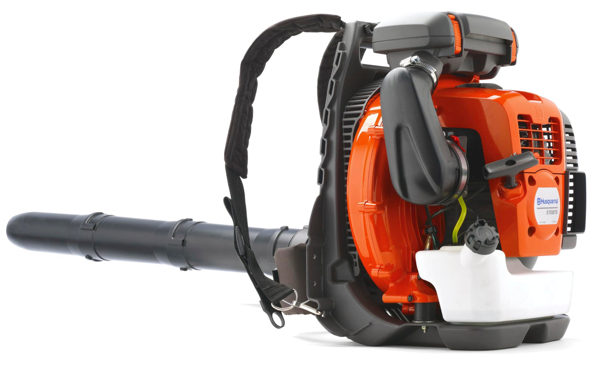 Husqvarna 570BTS worn with ventilated backpack harness for comfortable use.