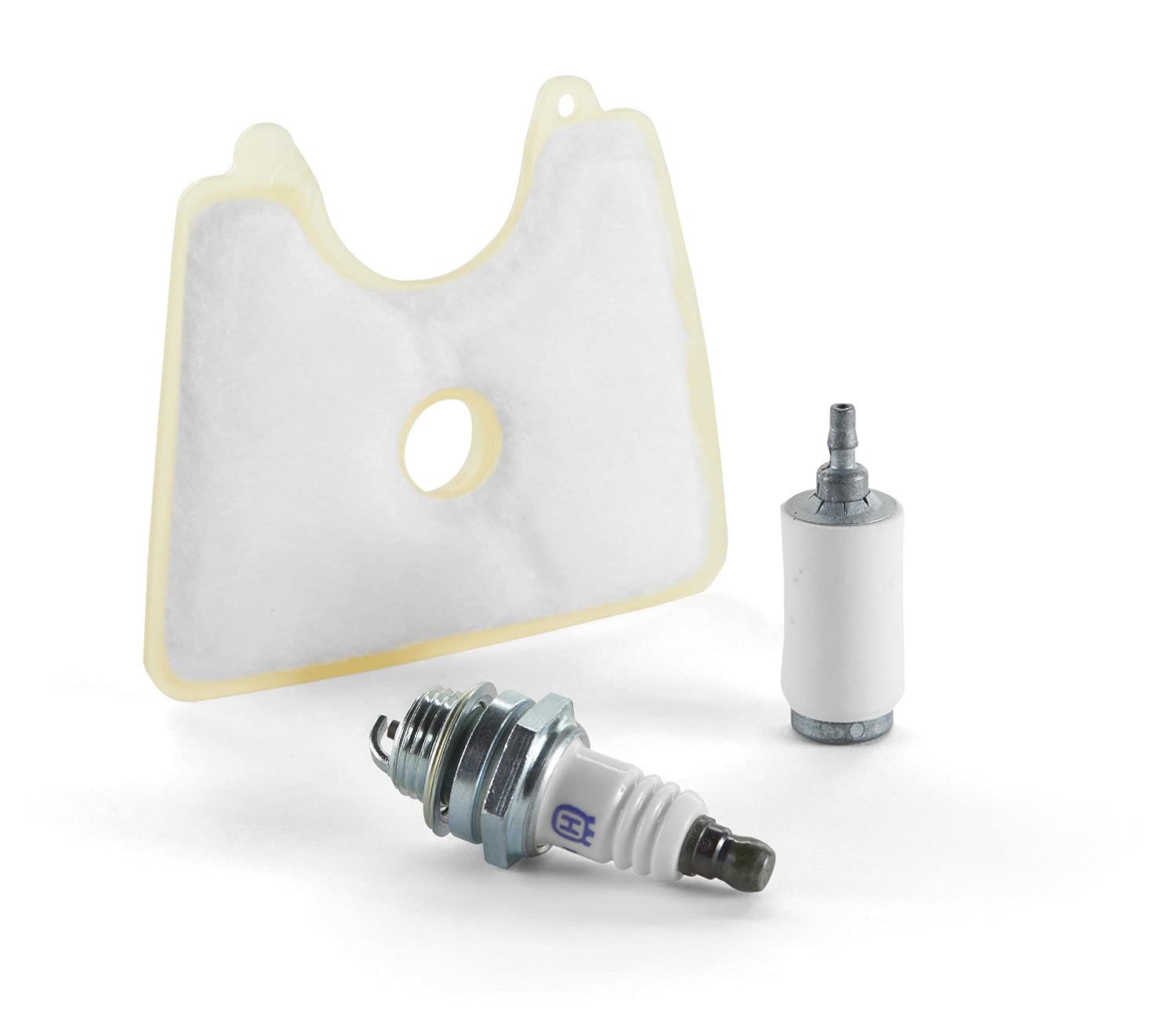 Husqvarna maintenance kit air filter and spark plug enhances startup and airflow.