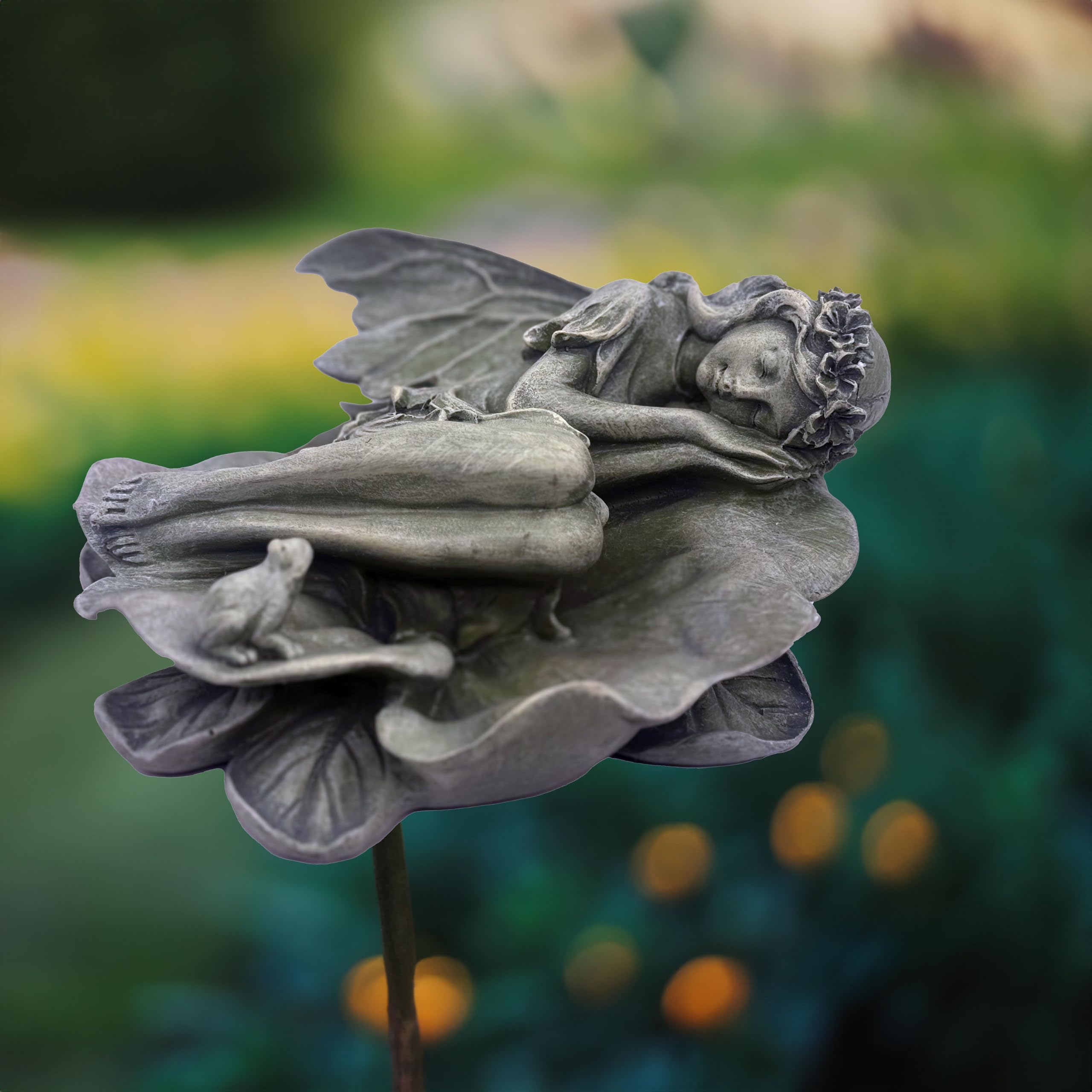 hvfun Garden Fairy Statue in bloom scene for seasonal charm.