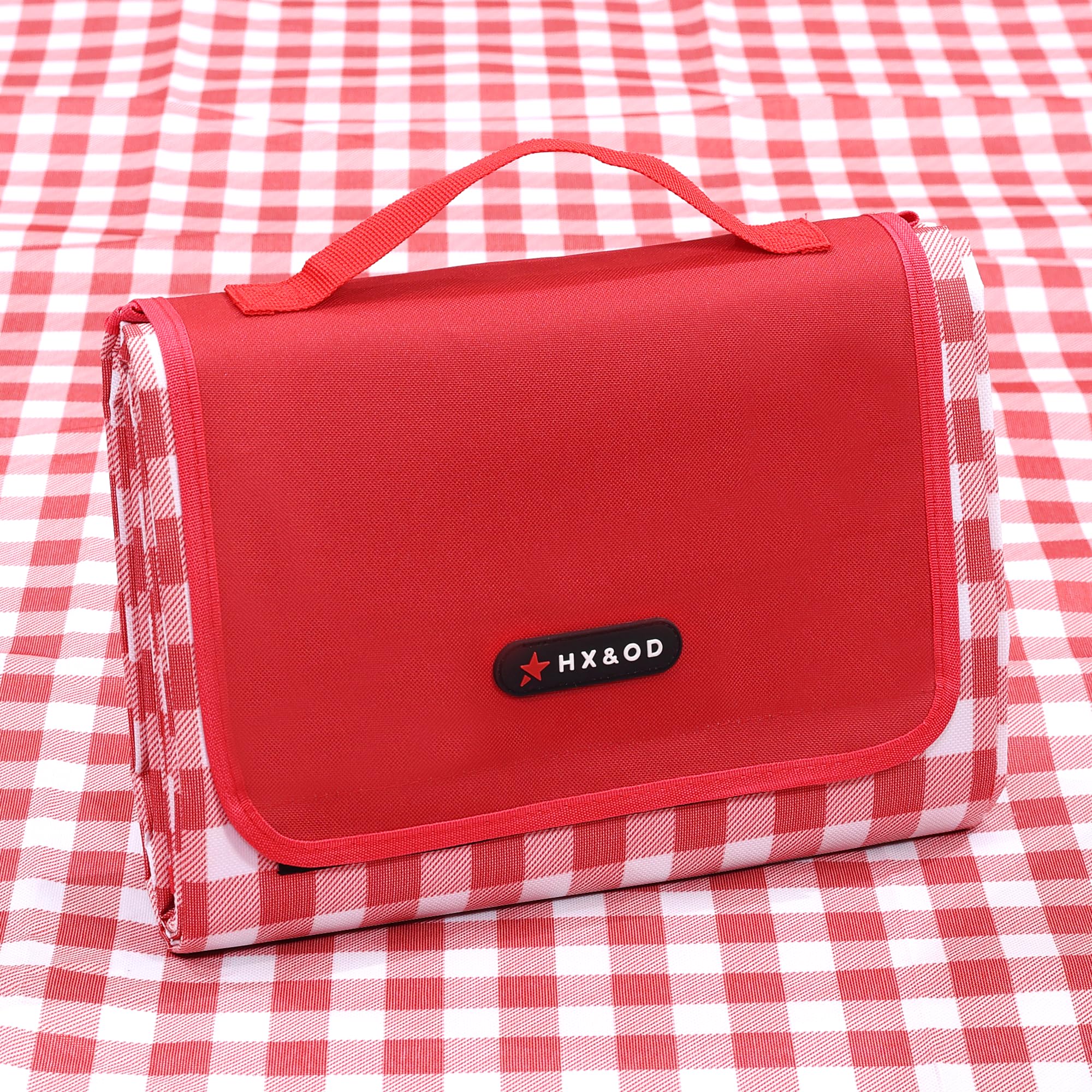 HX&OD picnic blanket with waterproof bottom for damp grass and wet sand.