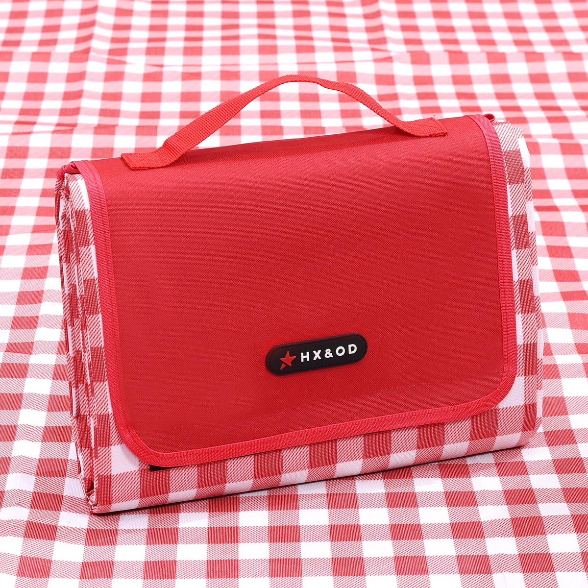 HX&OD picnic blanket with waterproof bottom for damp grass and wet sand.