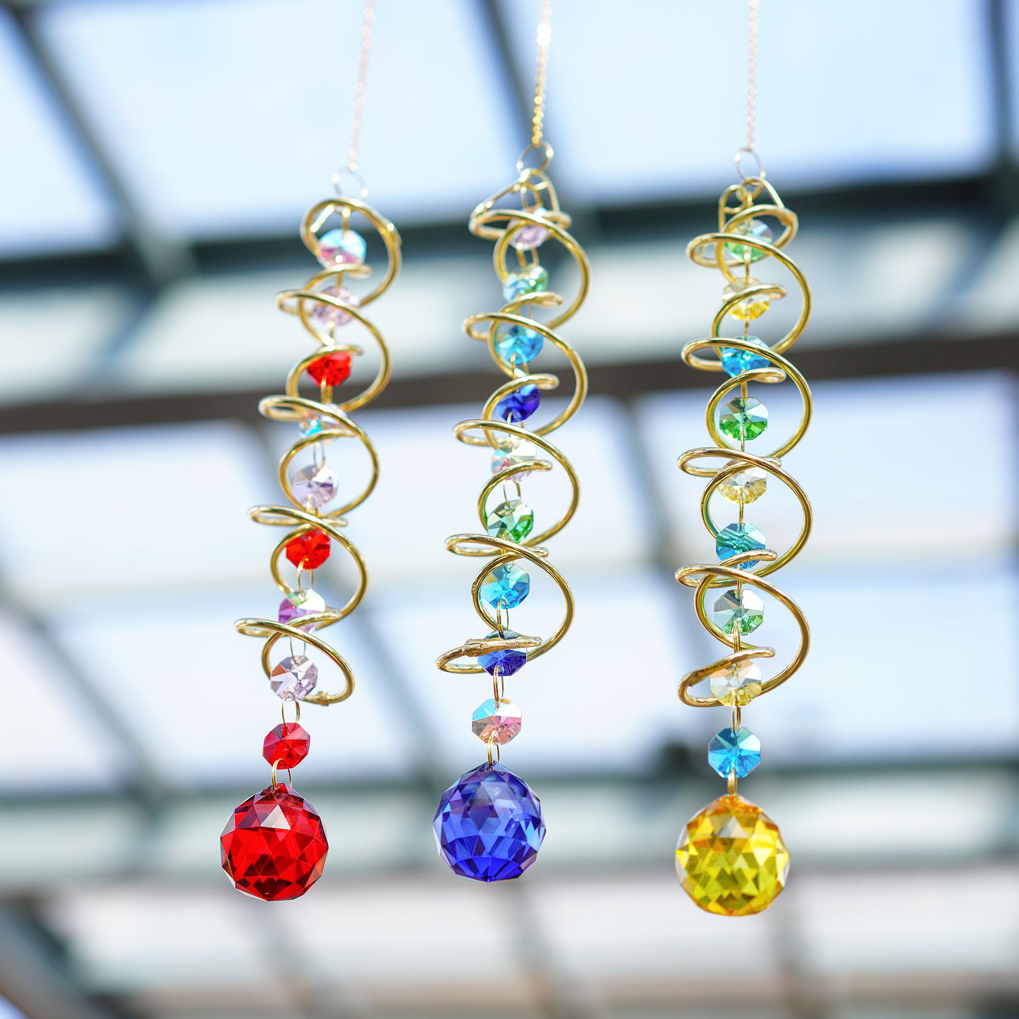 H&D Hyaline & Dora garden decor ball sparkles in sunlight.