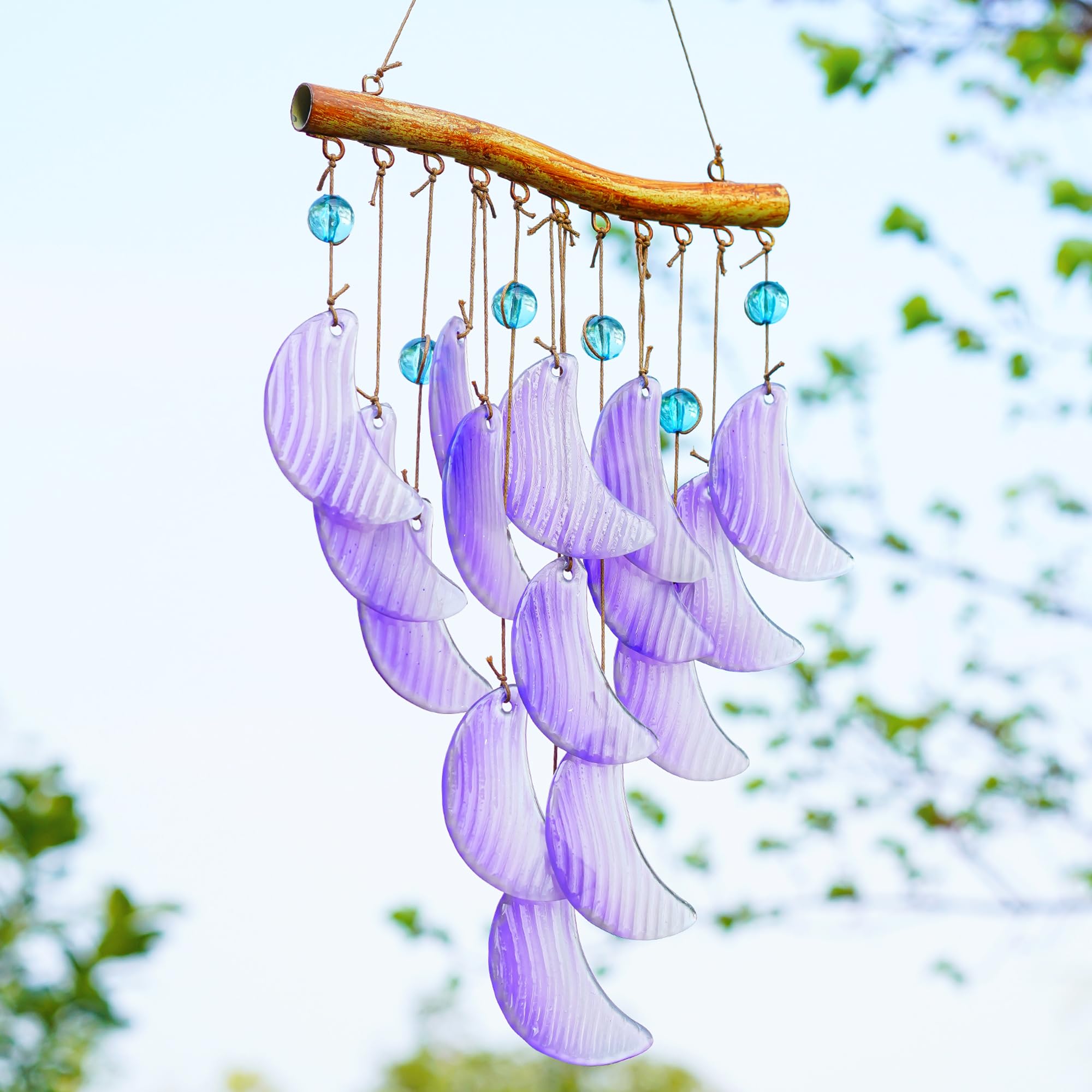 Hyaline Dora handmade glass wind chime adds indoor charm and soothing melodies.