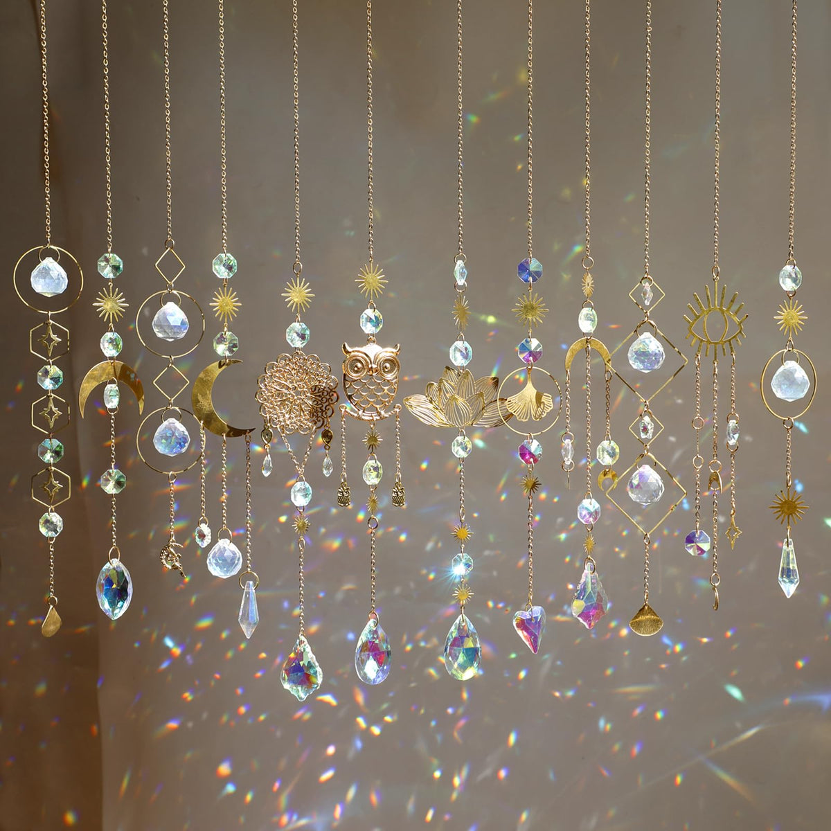 HYBEADS crystal suncatchers in a window creating rainbow light