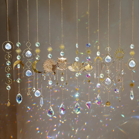 HYBEADS crystal suncatchers in a window creating rainbow light